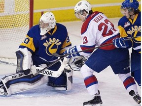 Edmonton Oil Kings’ Edgars Kulda gets a scoring chance against Saskatoon Blades goaltender Brock Hamm during first-period WHL action on March 10, 2015 at Rexall Place.
