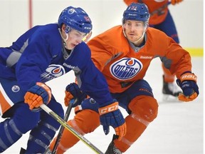 Edmonton Oilers defenceman Andrew Ference, right, keeps an eye on forward Ryan Nugent-Hopkins during Friday’s practice at the Clareview Community Recreation Centre.