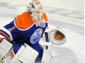 Edmonton Oilers goalie Laurent Brossoit takes the warm up in a game against the San Jose Sharks March 25, 2014, at Rexall Place in Edmonton.
