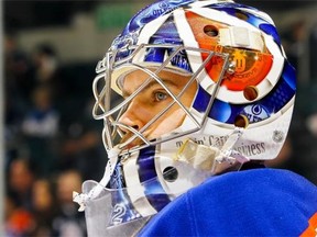 Edmonton Oilers goalie Richard Bachman takes part in the pre-game warm-up at the MTS Centre in Winnipeg Feb. 16, 2015, before a game against the host Jets.