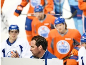 Edmonton Oilers interim head coach Todd Nelson explains a practice drill at Rexall Place on Dec. 29, 2014.