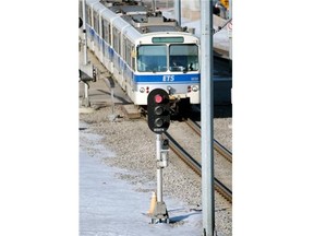 Edmonton Transit currently uses a system of red, yellow and green signal lights for LRT, but the new signalling system will have capacity to run driverless trains.