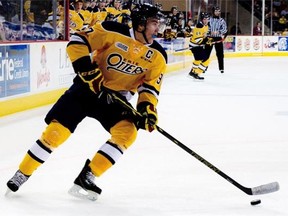 Erie Otters’ Connor McDavid controls the puck during an OHL game against the Sarnia Sting in Erie, Pa., Saturday, Oct.4, 2014. The NHL will hold the Connor McDavid draft lottery Saturday night at 6 p.m. MT. The winner of the most anticipated lottery since 2005 will be revealed before Game 2 between the New York Rangers and Pittsburgh Penguins.