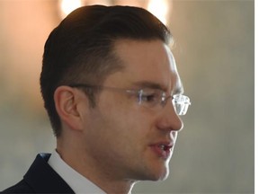Federal Employment Minister Pierre Poilievre speaks during a luncheon at the Hotel Macdonald in Edmonton on Monday, March 16, 2015.