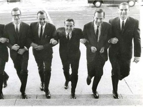 Opposition leader Peter Lougheed, third from right, heads into the Alberta legislature with the five other Progressive Conservative MLAs elected in 1967. From left, Len Werry, Lou Hyndman, Dr. Hugh Horner, Lougheed, Dave Russell, and Don Getty.