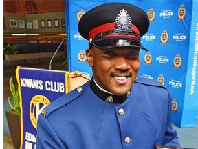 Former Edmonton Eskimo and now police school resource officer, Const. Rob Brown is selected Top Cop for volunteering countless hours to the Eastglen Blue Devils football team in Edmonton, March 6, 2015. The award was presented by the Kiwanis Club at EPS headquarters.