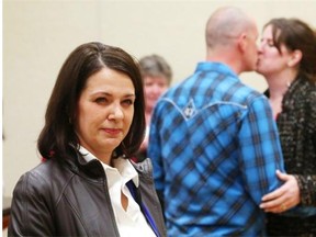 Former Wildrose Party leader Danielle Smith looks on as Okotoks town councillor Carrie Fischer defeats her in the Highwood Progressive Conservative nomination race in High River, Alta. on Saturday, March 28, 2015.