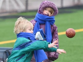 Four-year-old Gabriel Jakeway throws the ball during the Bocce Blast! tournament at Clarke Park on Saturday.