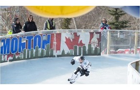 Francis Alarie of Canada skates into the finish area. Day one of Red Bull Crashed Ice at the Shaw Conference Centre in Edmonton is the National Shootout where the Canadian field is pared down by half.