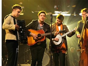 From left, Ben Lovett, Marcus Mumford, ‘Country’ Winston Marshall and Ted Dwane of Mumford & Sons