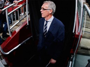 General manager Craig MacTavish of the Edmonton Oilers walks out to the bench before the NHL game against the Arizona Coyotes at Gila River Arena on Dec. 16, 2014, in Glendale, Ariz.
