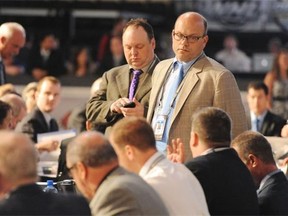 General Manager Peter Chiarelli of the Boston Bruins looks on from the team draft table during the 2012 NHL Entry Draft at Consol Energy Center on June 23, 2012, in Pittsburgh.