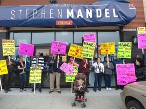 A group of Ryley residents protest in front of Stephen Mandel’s office in Edmonton on April 17, 2015.