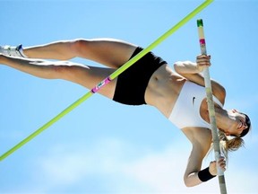 Heather Hamilton (Canada) clears the bar in the Women Pole Vault event at the Edmonton International Track Classic held at Foote Field in Edmonton on July 6, 2014.