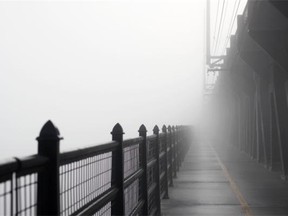 The High Level Bridge on a foggy morning on June 11, 2014.