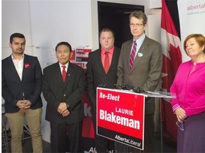 Interim Liberal Leader David Swann, second from the right, held a press conference April 8, 2015 with Laurie Blakeman, right, and other Liberal candidates at Blakeman’s campaign office in Edmonton.