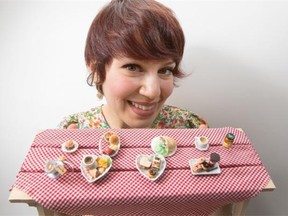 Jennifer Izquierdo displays her miniature ring collection.