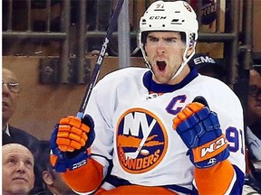 John Tavares of the New York Islanders celebrates his goal at 15:03 of the second period against the New York Rangers at Madison Square Garden on Oct. 14, 2014, in New York City.