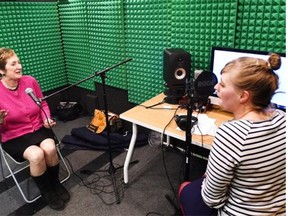 Kate Gunn (L) in the recording studio being interviewed by Alex Carruthers for a history project called In Your Own Words, in which people are invited to come record stories and interviews at the Stanley A. Milner Library in Edmonton.