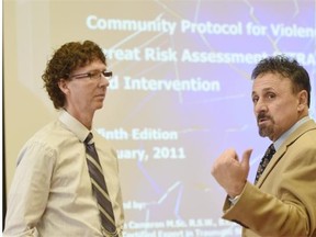 Kevin Cameron (left), trainer from the Canadian Centre for Threat Assessment and Trauma and Frank DeAngeles, retired principal from Columbine school, at a training session for dozens of school district principals and other administrators to recognize safety threats in schools at the Executive Royal Inn in Nisku on Thursday Mar. 5, 2015.
