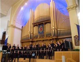 The Kokopelli Choir performs at a news conference at McDougall United Church in Edmonton April 1, 2015. The province announced that it is designating the church as a provincial historic site. The building will now be repurposed as a performing arts space in downtown Edmonton, with the church as a tenant.