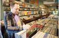 Kris Burwash, owner of Listen Records, prepares for Record Store Day this Saturday, April 18 in Edmonton.