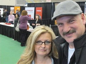 Lisa Bottolfs, left, and her husband Tom Bottolfs, a heavy equipment operator, attended the job fair for the Industrial Heartland in Fort Saskatchewan on Tuesday.