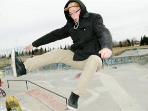 Logan Schwartz gets some air at the Mill Woods skate park on Monday, April 6, 2015. The city says the park has been closed because of safety concerns.