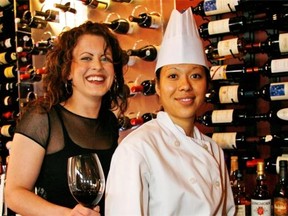 Managing partner Kelsey Danyluk, left, and chef Angela Schoonderbeek are pictured in Tzin Wine & Tapas. The restaurant is one of six Edmonton eateries that made the list compiled by OpenTable of the top 100 restaurants in Canada.