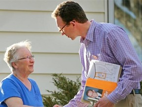 Marlin Schmidt, right, NDP candidate for the constituency of Edmonton-Gold Bar, does some campaigning on April 10, 2015.