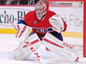 Montreal Canadiens  goalie Carey Price watches play during NHL action against the Carolina Hurricanes at the Bell Centre on March 19, 2015, in Montreal.