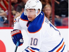 Nail Yakupov #10 of the Edmonton Oilers skates with the puck during the NHL game against the Arizona Coyotes at Gila River Arena on December 16, 2014 in Glendale, Arizona. The Coyotes defeated the Oilers 2-1 in overtime.