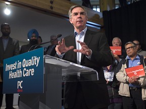 Progressive Conservative Leader Jim Prentice gives a speech on health care at Whitemud Creek Community Centre in Edmonton on April 14, 2015.