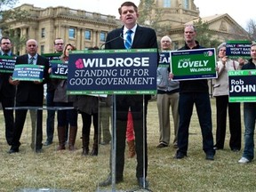 Wildrose Leader Brian Jean stands on the front lawn of the Alberta Legislature during a news conference in Edmonton on April 14, 2015.