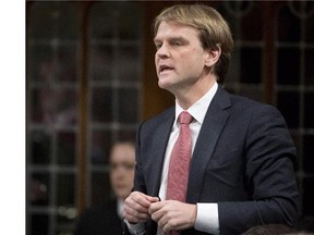 Citizenship and Immigration Minister Chris Alexander responds to a question during question period in the House of Commons on Parliament Hill in Ottawa on Thursday, January 29, 2015.