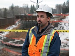 Allan Bartman, General Supervisor for Transportation Special Projects, City of Edmonton, near the 102 Avenue bridge construction site over Groat Road on March 12, 2015. Starting Friday, March 13 at 7:30pm, Groat Road will be closed from 107 Avenue to River Valley Road to allow steel girders to be installed. The work is expected to be completed over the weekend, however the traffic closure may carry over to Monday March 16.