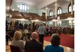 The choir performs at the McDougall United Church in Edmonton on April 1, 2015 when the city and province announced funding to renovate the building.