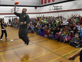 Edmonton Eskimo Ryan King came out to support Jump Rope for Heart at St. Clement School in Edmonton on Monday Mar. 16, 2015.