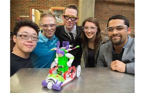 From left: Kelvin Duong, Tyler Thagard, Kyle Keep, Sarah Toogood, and Khilesh  Jairamdas. Inspired by the Buzz Lightyear ride at Disneyland, University of Alberta engineering students have designed and built robotic vehicles capable of navigating a maze, using on-board cameras to identify targets along the route and cross a finish line within a set time. The student teams will launch their vehicles March 30th in a competition that forms part of their Mechanical Design I final exam. At the beginning of the course, each team is given the same materials and resources, including access to a fully equipped shop, 3-D printers and the expertise of technicians in the Department of Mechanical Engineering in Edmonton, March 30, 2015.