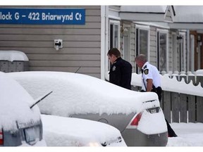 Police investigate the scene of a suspicous at 422 Briarwynd Court in Edmonton on March 22, 2015.