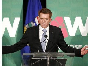 Wildrose Leader Brian Jean said Thursday his party would balance the budget in three years, without raising taxes, by cutting 3,200 civil servants and deferring “lower priority” infrastructure projects.