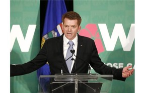 Wildrose Leader Brian Jean said Thursday his party would balance the budget in three years, without raising taxes, by cutting 3,200 civil servants and deferring “lower priority” infrastructure projects.