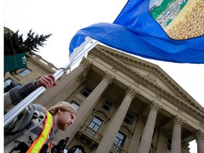 Nick Dehod, Vice President Student Life for the U of A Students Union holds up an Alberta flag at the Alberta Legislature. Students from across the province, some travelling from as far as Lethbridge and Calgary, marched from the Students’ Union Building at the University of Alberta to the Alberta Legislature in protest of tuition increases in Edmonton on March 18, 2010.