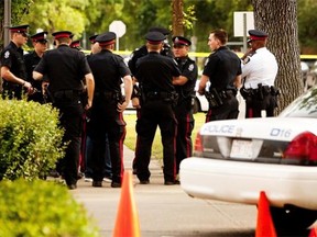 Officers blocked off a small section of 113th Street, just north of Jasper Avenue, and a portion of the adjoining parking lot behind the Joey Jasper restaurant on Aug. 13, 2012 after a man was shot and killed.