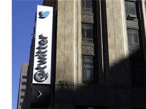 This Nov. 4, 2013 file photo shows the sign outside of Twitter headquarters in San Francisco.