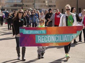 Participants take part in the Journey to Reconciliation Symbolic Walk and Community Round Dance on March 27, 2015, in Edmonton. The walk started at the Shaw Conference Centre and concluded at Churchill Square.