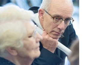 Provincial Health Minister Stephen Mandel speaks with patient Lois Davis at Capital Care Norwood after a health announcement on March 11, 2015.