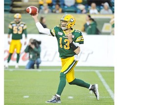 Quarterback Mike Reilly of the Edmonton Eskimos throws the ball against the B.C. Lions in a Canadian Football League game at Commonwealth Stadium on Nov. 1, 2014.