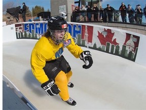 Richard Abbott of Canada flies into the finish area Thursday at Crashed Ice Edmonton near the Shaw Conference Centre.