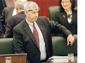 Robin Campbell, Alberta Minister of Finance, pauses for reflection before delivering the provincial budget speech at the Alberta Legislature on March 26, 2015.